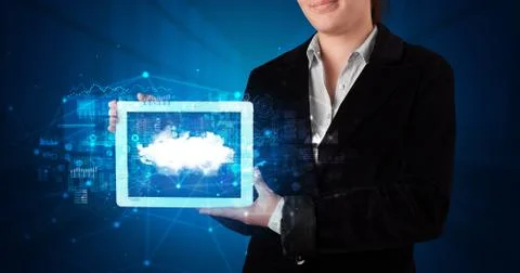 Hand holding tablet with cloud technology concept Foto stock