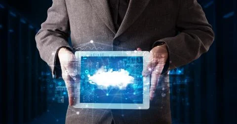 Hand holding tablet with cloud technology concept Foto stock