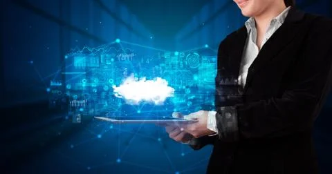 Hand holding tablet with cloud technology concept Foto stock