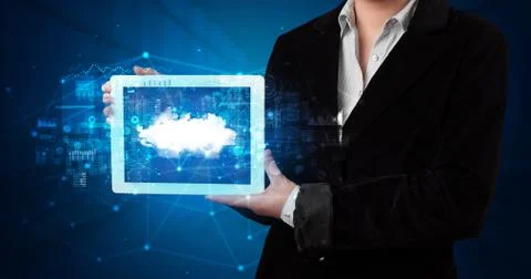 Hand holding tablet with cloud technology concept Foto stock