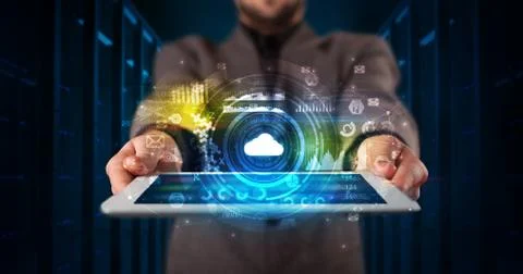 Hand holding tablet with cloud technology concept Foto stock