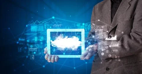 Hand holding tablet with cloud technology concept Foto stock