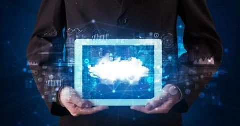 Hand holding tablet with cloud technology concept Foto stock