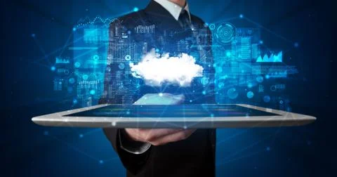 Hand holding tablet with cloud technology concept Foto stock