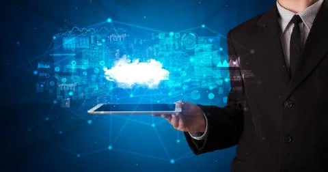 Hand holding tablet with cloud technology concept Foto stock