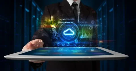 Hand holding tablet with cloud technology concept Foto stock