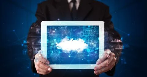 Hand holding tablet with cloud technology concept Foto stock