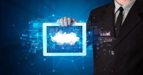 Hand holding tablet with cloud technology concept Stockfoto's