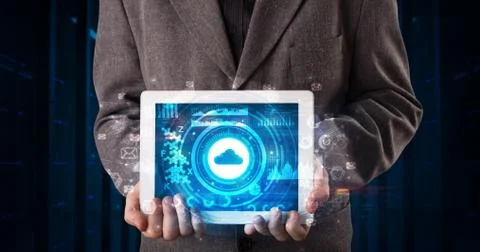 Hand holding tablet with cloud technology concept Foto stock