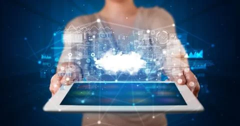 Hand holding tablet with cloud technology concept Foto stock