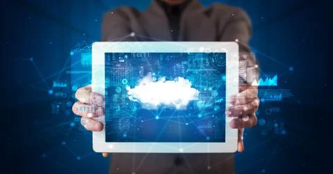 Hand holding tablet with cloud technology concept Foto stock