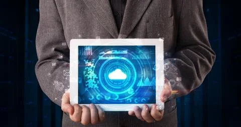 Hand holding tablet with cloud technology concept Foto stock