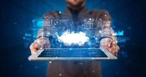 Hand holding tablet with cloud technology concept Foto stock