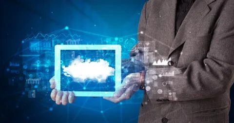 Hand holding tablet with cloud technology concept Foto stock