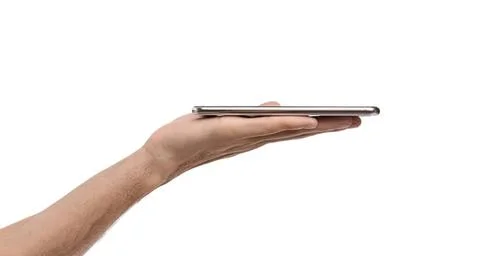 Hand holding a tablet computer with a white background Stock Photos