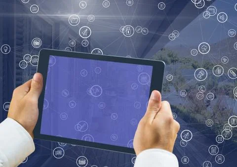 Hand holding tablet with connectors Foto stock