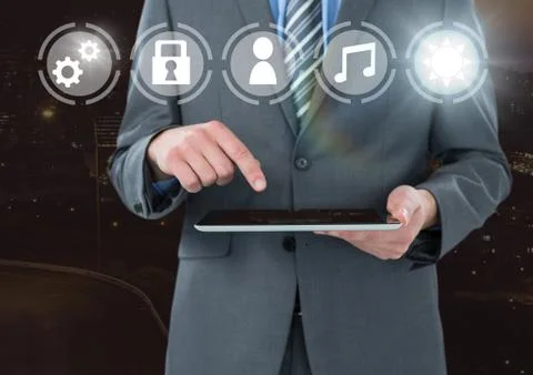 Hand holding tablet with icons interface of internet of things Stock Photos
