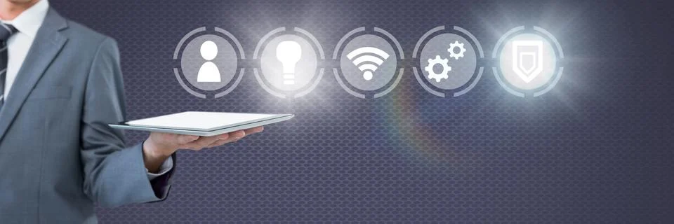 Hand holding tablet with icons interface of internet of things Stock Photos