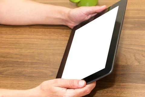 Hand Holding Tablet Stock Photos