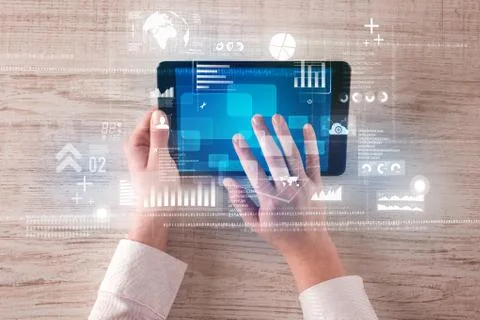 Hand holding tablet Stockfoto's