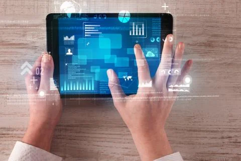 Hand holding tablet Stockfoto's