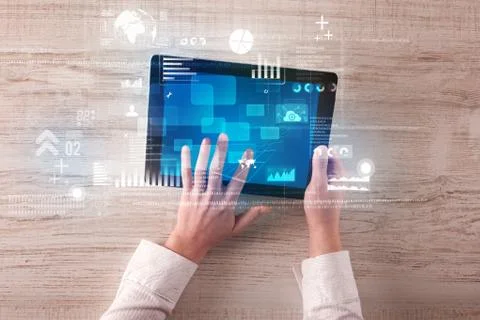 Hand holding tablet Stockfoto's