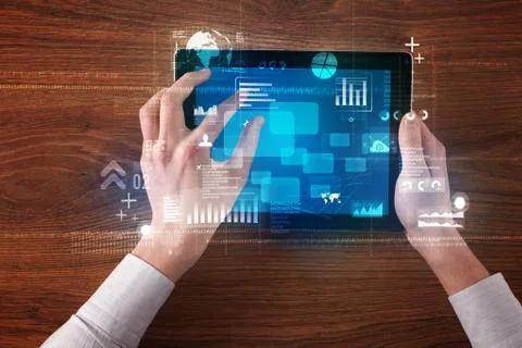 Hand holding tablet Stockfoto's