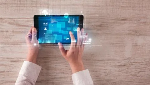 Hand holding tablet 库存照片