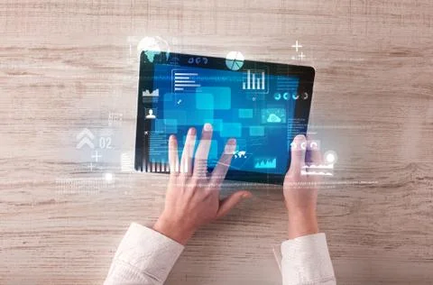 Hand holding tablet Stockfoto's