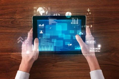 Hand holding tablet Stockfoto's