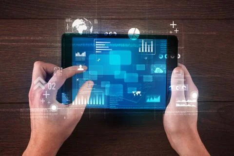Hand holding tablet Stockfoto's