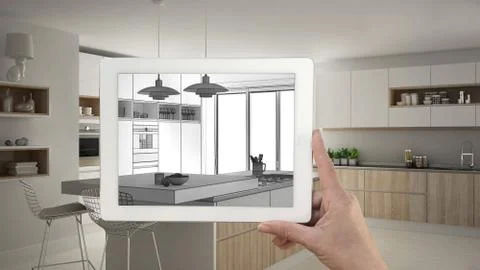 Hand holding tablet showing kitchen sketch or drawing. Real finished modern k Stock Illustration