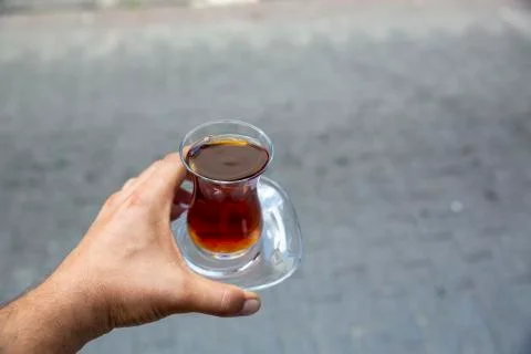 Hand holding tea 스톡 사진