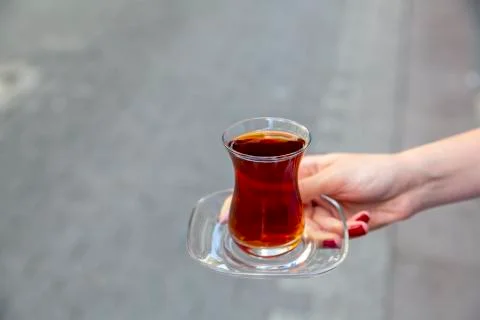 Hand holding tea Stock Photos