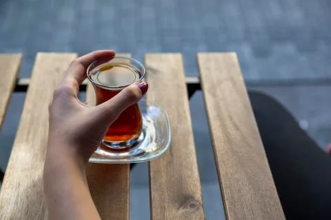 Hand holding tea Stock Photos