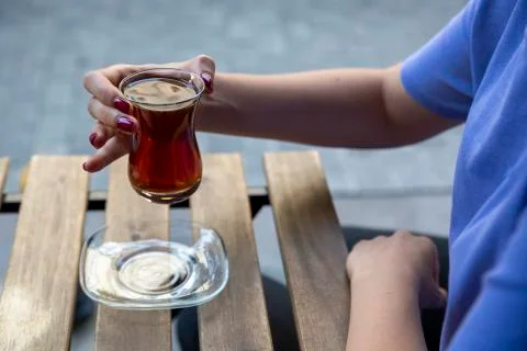 Hand holding tea Stock Photos