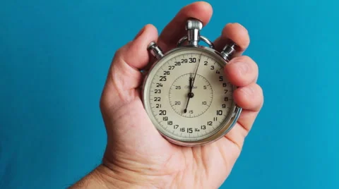 Hand Holding Three-Button Stopwatch Blue Background Stock Footage 49524757