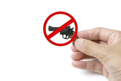 Hand Holding Tiny Model Pistol Gun with Red Sigh Forbidden Stop Violence Stock Photos