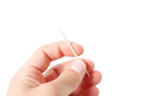 Hand holding toothpicks Stock Photos