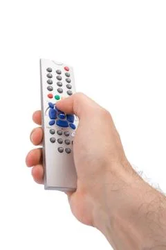 Hand holding a tv remote control isolated on white. Stock Photos