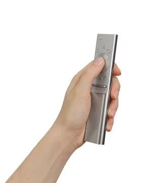 Hand holding, using remote control, TV channel turning on Stock Photos