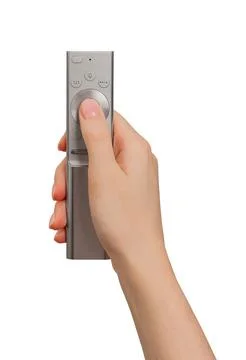 Hand holding, using remote control, TV channel turning on and off Stock Photos