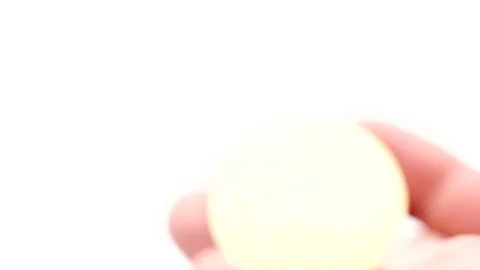 Hand holding a virtual bit-coin coin between his fingers. Stock Footage 124808632