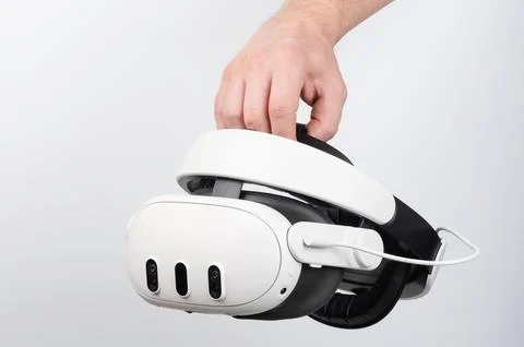 Hand holding vr headset Stock Photos