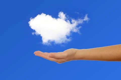 Hand holding a white cloud Foto stock