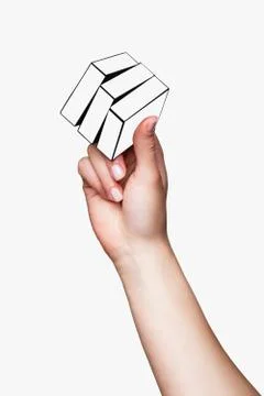 Hand holding white cube Stock Photos