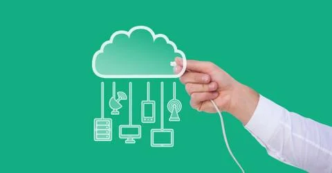 Hand holding wire connection with cloud devices Stock Photos