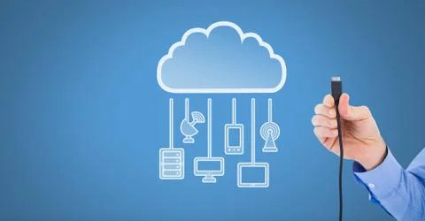 Hand holding wire connection with cloud devices Stock Photos