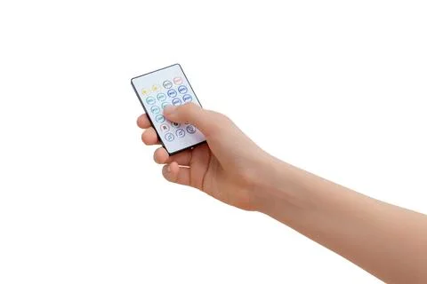 Hand holding wireless remote control isolated on white background used for .. Stock Photos