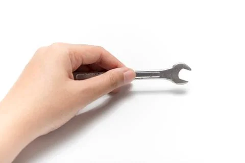 Hand holding wrench Stock Photos